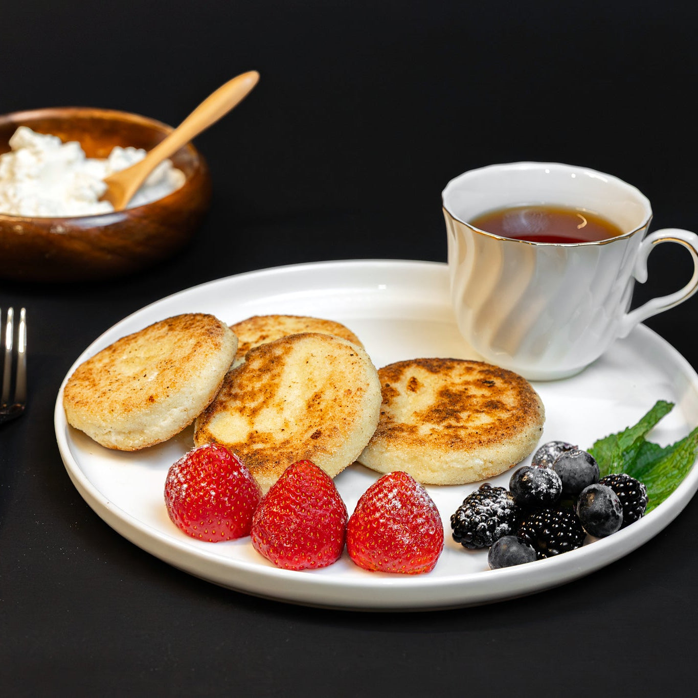 Syrniki (farmer’s cheese pancakes)